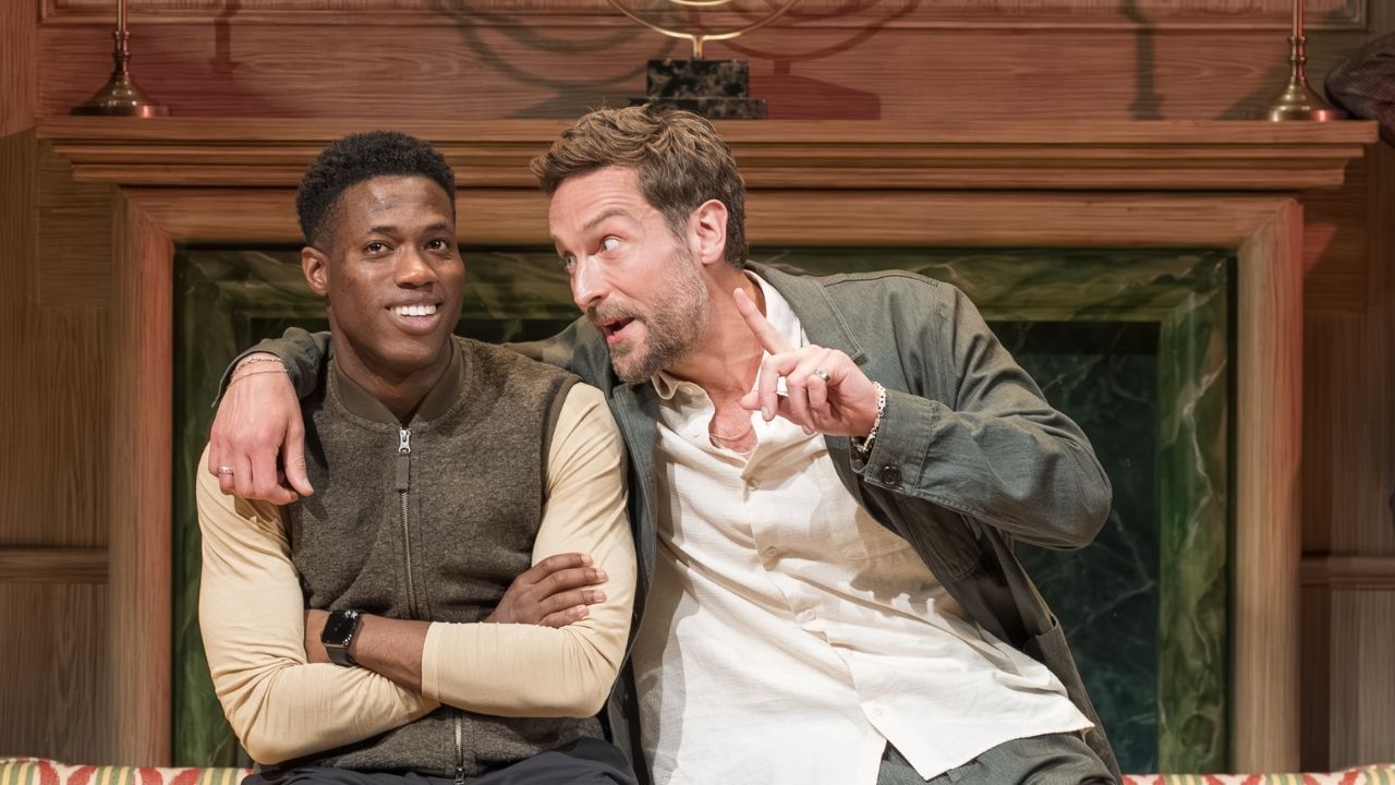 a man with his arm around another man